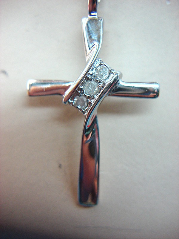Sterling silver diamond cross necklace with three natural diamonds