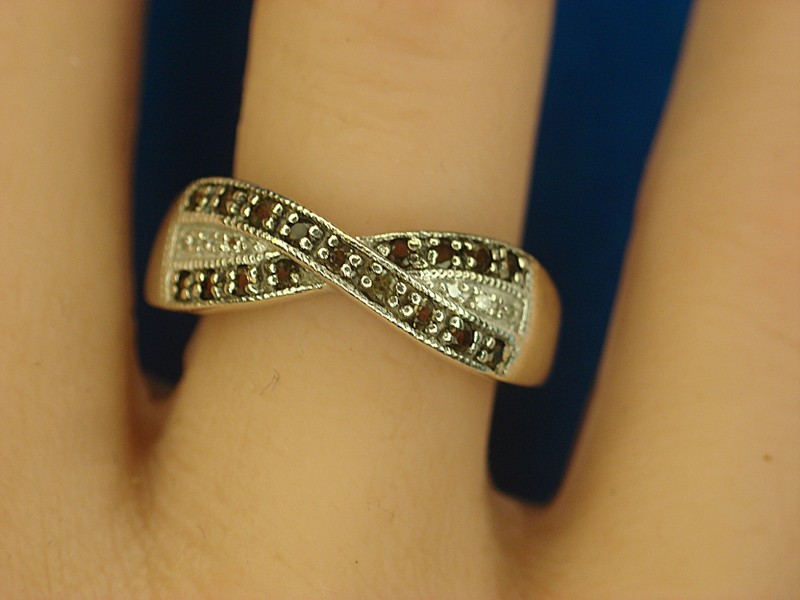 Sterling silver cross-over ring with dark stones and accent diamonds, size 8