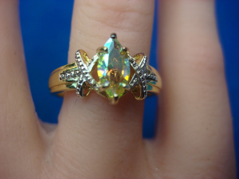 Sterling silver ring with gold vermeil accents and iridescent marquise stone, size 8