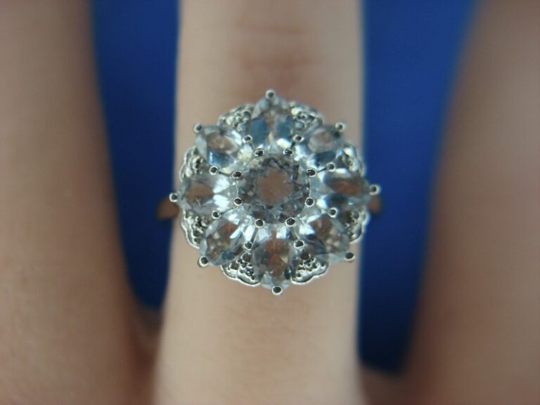 Sterling silver cocktail ring with round and baguette diamond simulants
