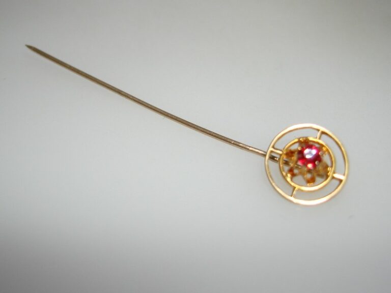 Antique Art Deco 10K gold stick pin with faux ruby