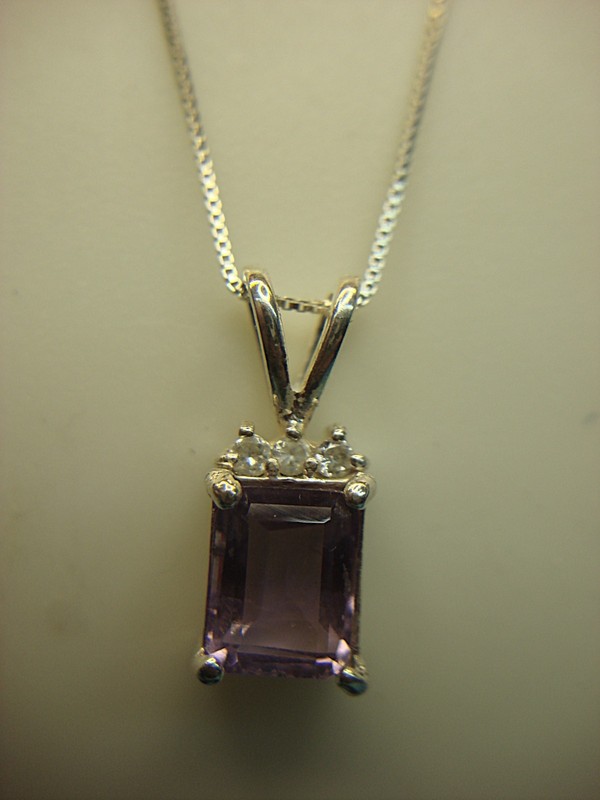 Emerald cut amethyst pendant with sterling silver box chain