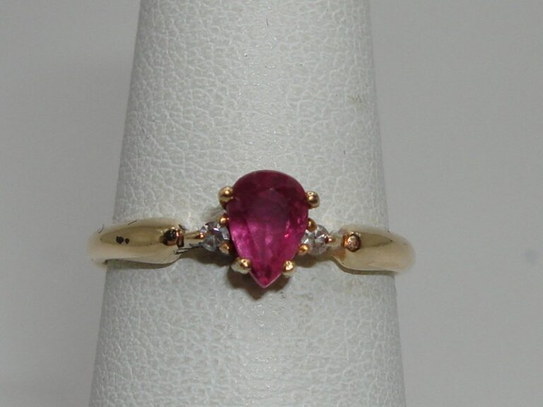 14K gold ring with pink topaz and diamond accents, size 5