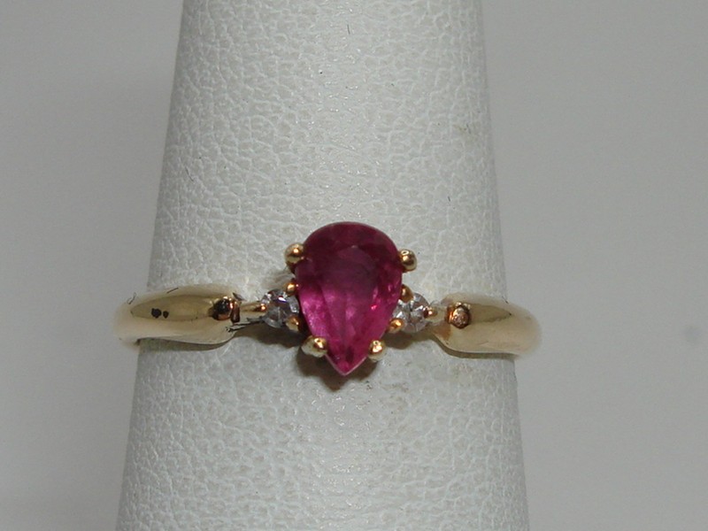 14K gold ring with pink topaz and diamond accents, size 5