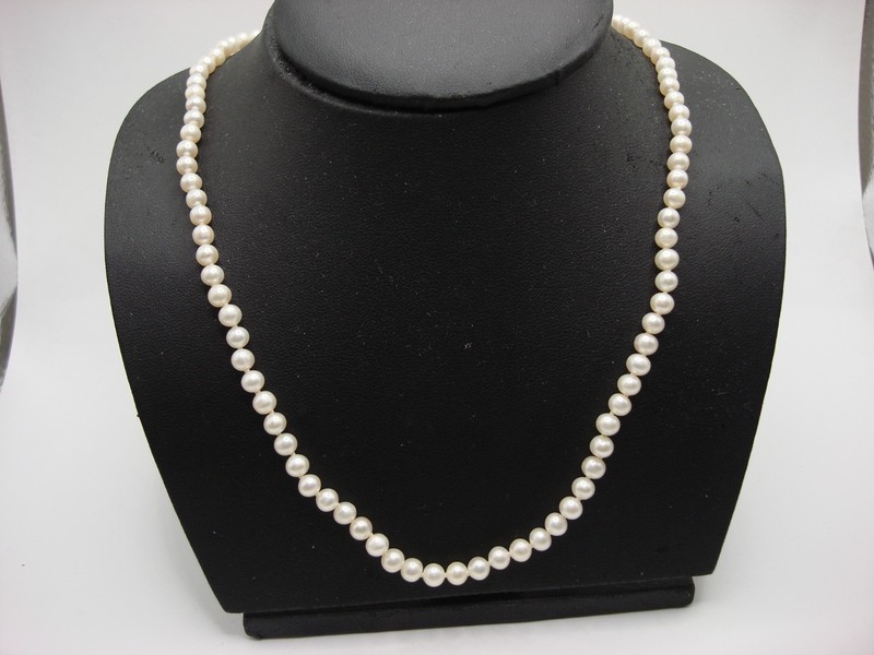 Creamy white freshwater pearl necklace with 14K gold clasp