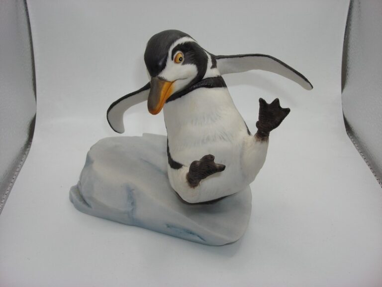 Hand-painted porcelain penguin figurine from the 1985 Franklin Mint collection