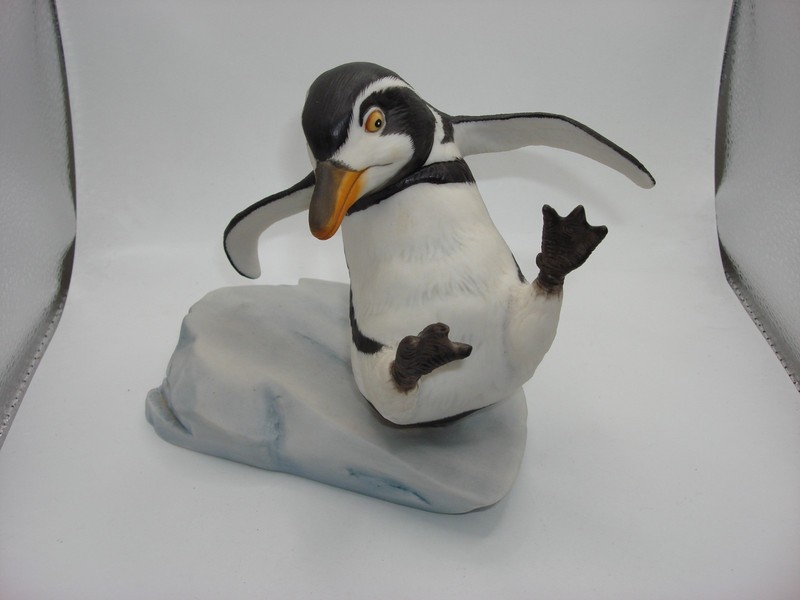 Hand-painted porcelain penguin figurine from the 1985 Franklin Mint collection