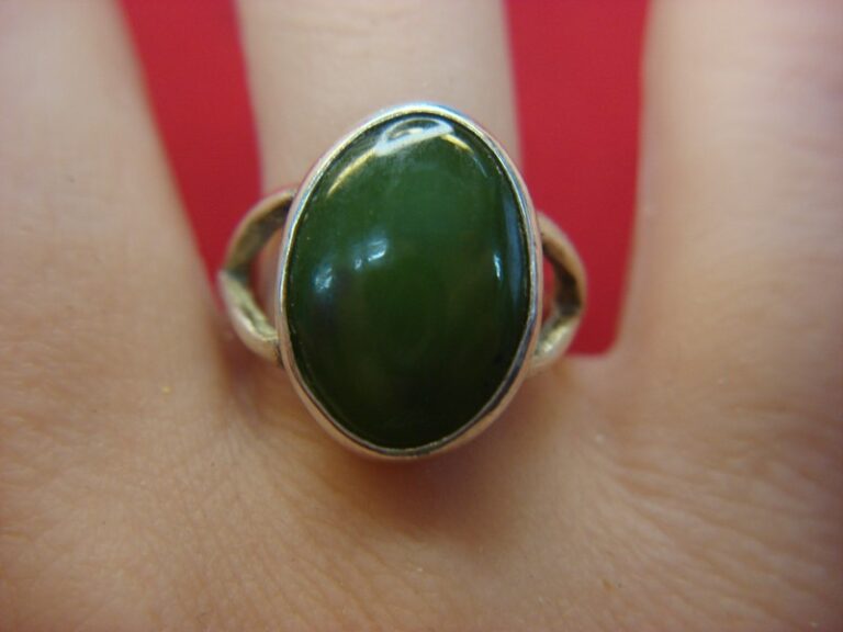 Sterling silver ring with olive green stone, size 8+