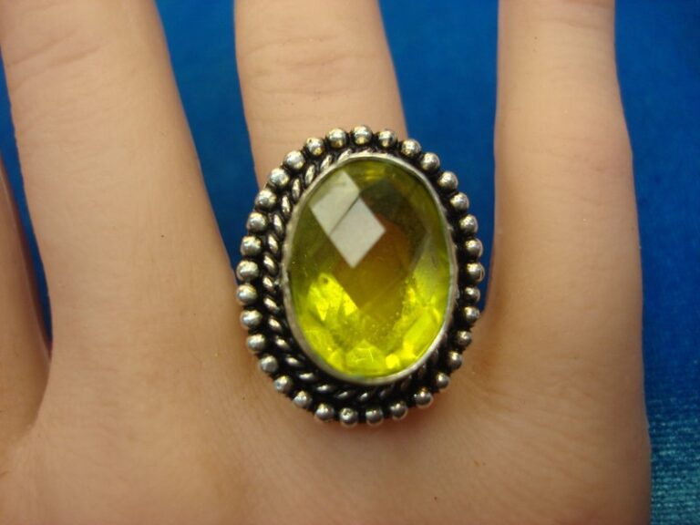 Sterling silver ring with a large lime green stone, size 7 3/4