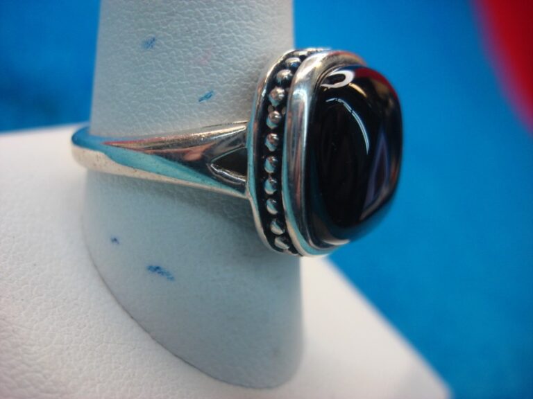 Sterling silver ring with a large black stone, size 10