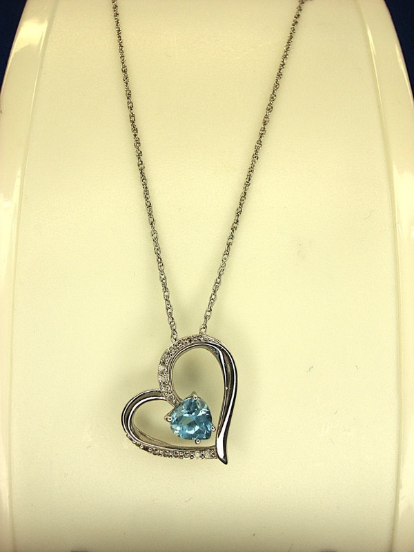 Sterling silver heart pendant with aqua heart and topaz accents