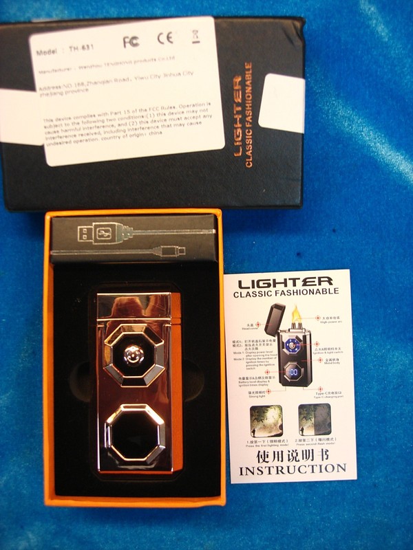 Copper tone rechargeable dual-arc plasma lighter with flashlight and box