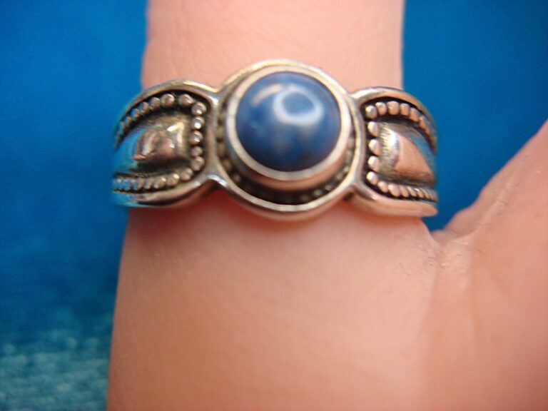 Adjustable sterling silver ring with amethyst