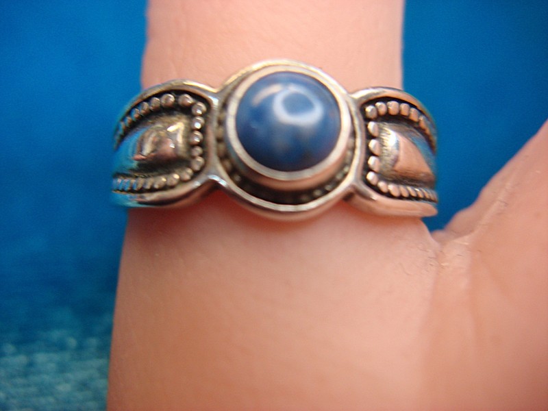 Adjustable sterling silver ring with amethyst