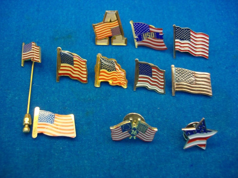 Collection of 10 unique United States flag pins in various styles