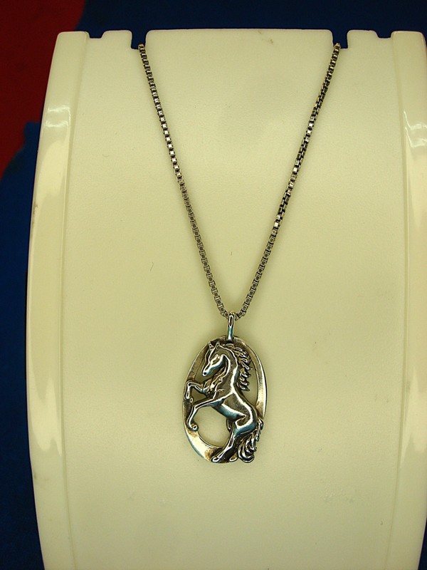 Sterling silver filigree rearing horse pendant necklace