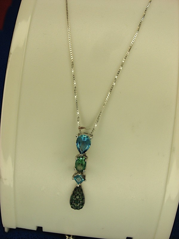 Sterling silver oval topaz pendant with blue and green gemstones, 1 1/4 inches long, on an 18 inch sterling silver box link chain
