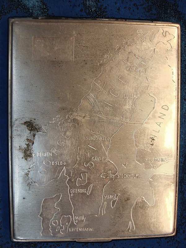 Vintage silver plated cigarette case with a map of Norway, Sweden, and Finland