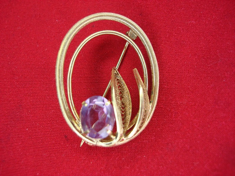 Vintage amethyst gold-filled pin with a 2-carat prong-set amethyst.