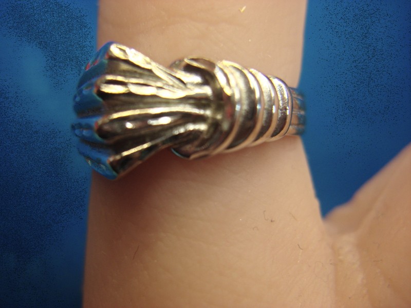 Sterling silver ring with diamond accents, fancy pattern, size 8