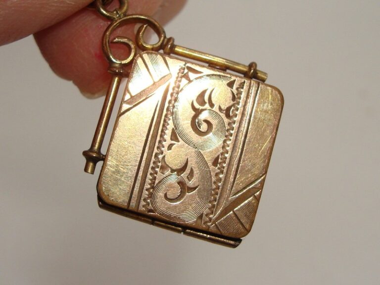 Antique Victorian rose gold filled S&B Co. locket fob, engraved and signed, with picture compartments.