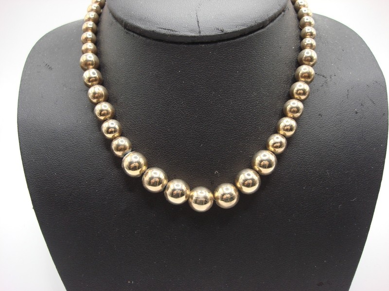 Vintage gold tone metal bead choker necklace