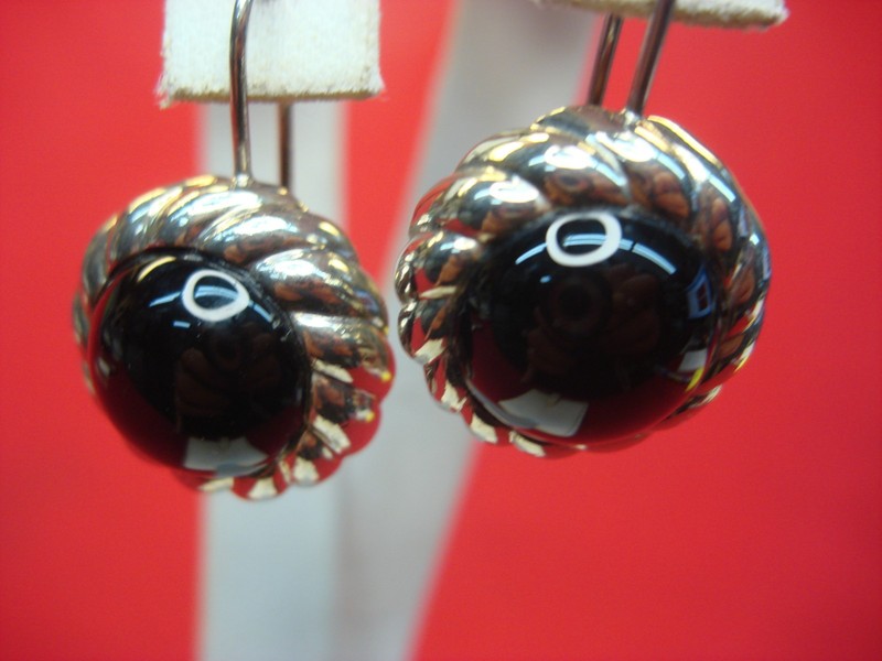 Sterling silver dangle earrings with onyx inlays